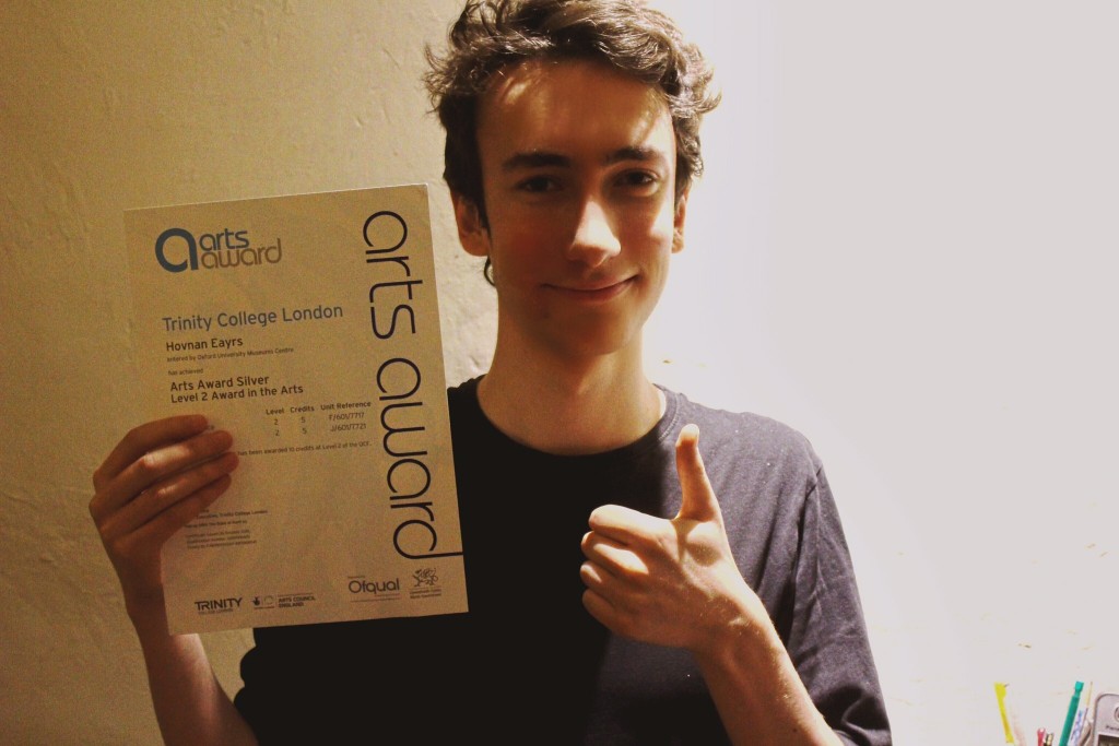 Hovan with his Arts Award Certificate