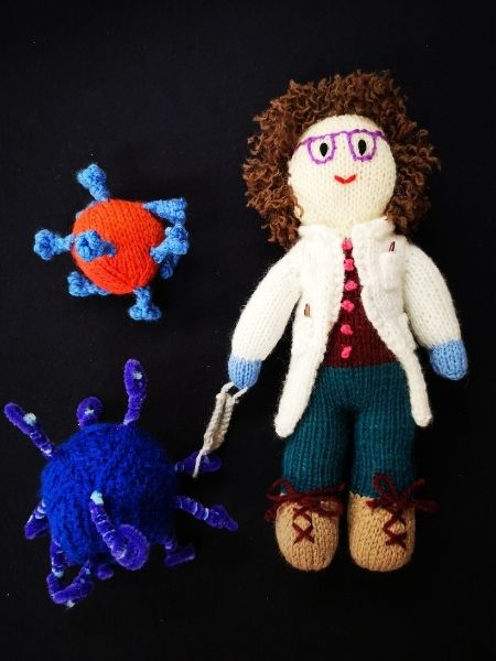 This knitted scientist and virus particles were made by Marion Watson, Head of Operations at CCVTM, where the clinical parts of the COVID-19 vaccine trial work took place.