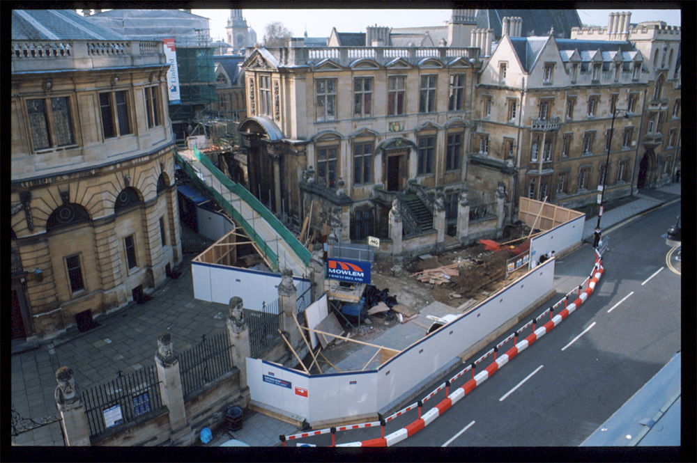The outside of the Museum during extensive renovations in 1999. Boards have been put along Broad Street to cordon off the building, and the pavement immediately in front of the Museum is being dug up to alter the foundations