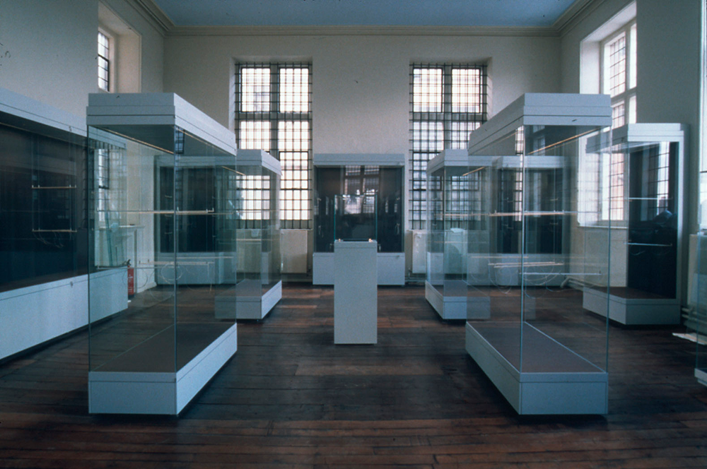 the top gallery of the Museum filled with empty exhibition cases
